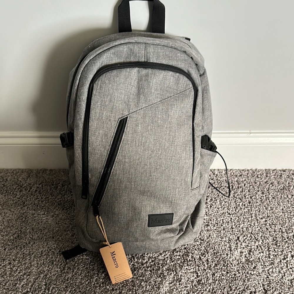 Gray Backpack with phone charger
